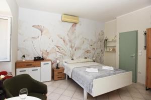 Postel nebo postele na pokoji v ubytování Apartmani Zukic