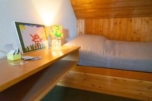 Giường trong phòng chung tại Silberplatten