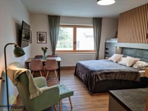 Postel nebo postele na pokoji v ubytování MINIMAX apartmán