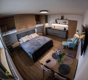Postel nebo postele na pokoji v ubytování MINIMAX apartmán