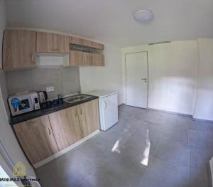 Kuchyň nebo kuchyňský kout v ubytování MINIMAX apartmán