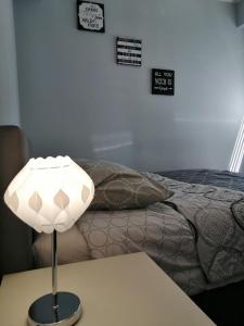 Кровать или кровати в номере Apartament Mazowiecka