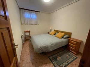 En eller flere senge i et værelse på Casa Rural Santo Domingo