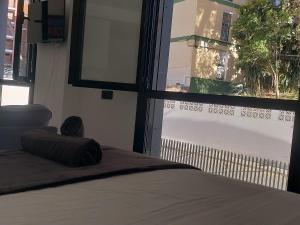 Posteľ alebo postele v izbe v ubytovaní Terraza del Bajondillo Torremolinos
