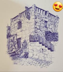 a drawing of a building with a smiley face on it at A CASA DE ABAIXO LOIRA in Marín