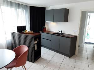 Kuchyň nebo kuchyňský kout v ubytování Moderne Gästesuite + 10 fotografií