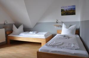 Un pat sau paturi într-o cameră la RugApart