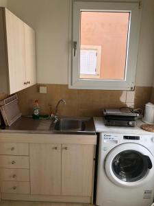 Kuchyň nebo kuchyňský kout v ubytování Ipsos apartment