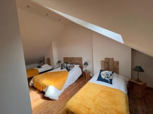 Ένα ή περισσότερα κρεβάτια σε δωμάτιο στο Villa du casino