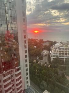 a view of a sunset from a building at Arcadia Adelina in Odesa