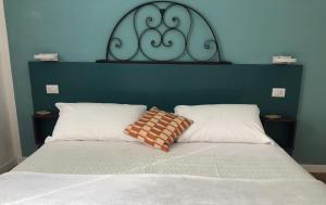 Postel nebo postele na pokoji v ubytování DIMOR'A' ROOMS