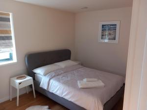 Postel nebo postele na pokoji v ubytování The Woodshed