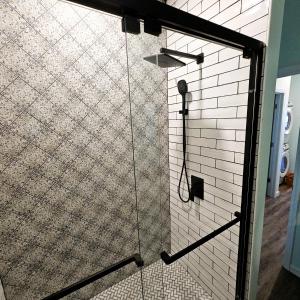 a shower with a glass door in a bathroom at Aly-Kats Flip Flop Flat in Rockport +24 photos