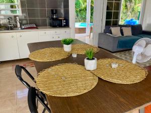 Fotografie z fotogalerie ubytování Maison SELAH F3 Piscine Jardin Privatif Citerne v destinaci Le Moule + 4 fotografie