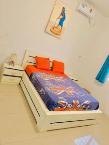 Postel nebo postele na pokoji v ubytování Maison calme avec piscine à Saly