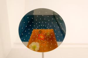 a mirror with a picture of a person in a room at o' mar - Amalfi Coast Suite in Praiano