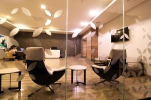 TV a/nebo společenská místnost v ubytování QUARTZ HOTEL & SPA