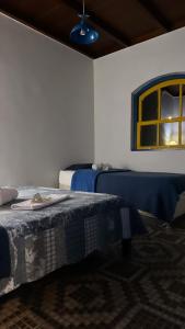 Un pat sau paturi într-o cameră la Hostel 040