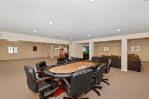 a conference room with a table and chairs at Minnow's Big Bear Estate 1.5 Acres W Game Room in Big Bear City