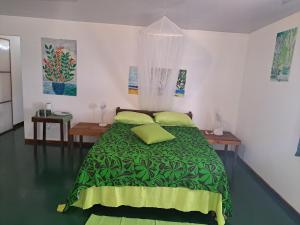 Tifaifai Et Café Huahine客房内的一张或多张床位