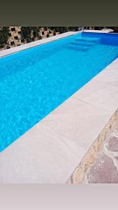 The swimming pool at or close to Il Podere di Massi