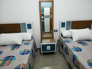 Cama o camas de una habitación en Palmera Beach