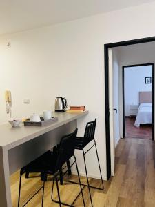 En eller flere senge i et værelse på Departamento confortable centro Wi Fi - cochera opcional