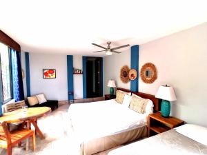 Postel nebo postele na pokoji v ubytování Ananda Guesthouse