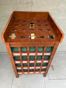 a wooden box filled with lots of different types ofitures at Casa de campo Huachipa in Lima