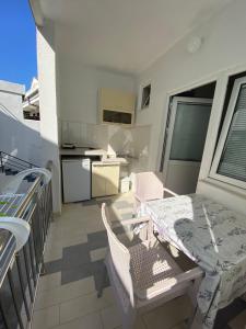 Kuchyň nebo kuchyňský kout v ubytování Apartmani Resetar