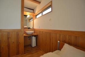 Postel nebo postele na pokoji v ubytování Guest House Ilonggo