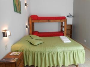 Ένα ή περισσότερα κρεβάτια σε δωμάτιο στο Alta Gracia Hostel