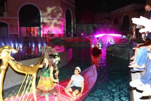 two girls riding on a boat in a water pageant at Paradise Town Villa Legend in Belek +38 photos