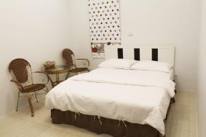 Postel nebo postele na pokoji v ubytování Lefu B&B