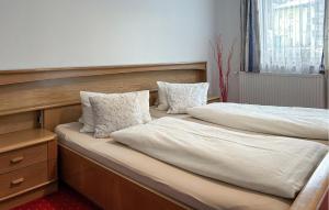 Posteľ alebo postele v izbe v ubytovaní Gemuetliche Ferienwohnung