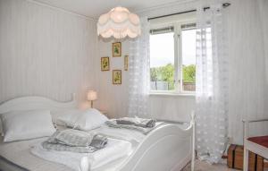 Voodi või voodid majutusasutuse Lovely Home In Slvesborg With House A Panoramic View toas