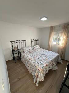 Ένα ή περισσότερα κρεβάτια σε δωμάτιο στο Apartamento de Encanto