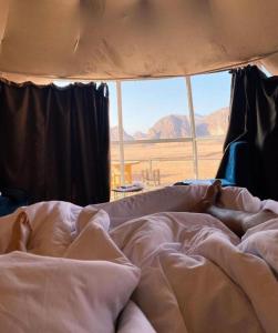 Ένα ή περισσότερα κρεβάτια σε δωμάτιο στο Rum parens