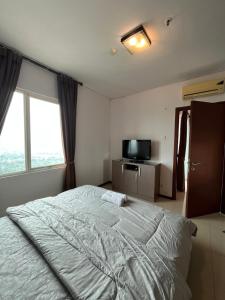 Postel nebo postele na pokoji v ubytování Comfy & Modern 1BR At Central