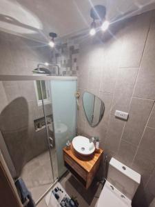 Ванная комната в Villa Bienvenue Beachfront House