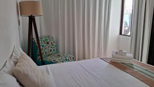 Letto o letti in una camera di Casa Iola