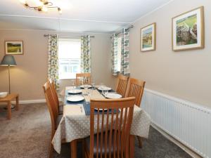 a dining room with a table and chairs at Alma House in Richmond