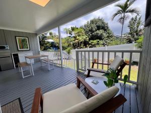 A balcony or terrace at Sunset Shores - UNIT B Kaiupoho