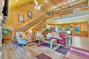 a living room with a couch and a table at Back Stroke chalet in Gatlinburg
