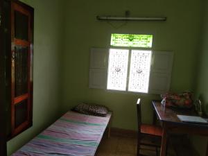 Giường trong phòng chung tại KINGS TOWN - Heritage Village County