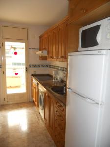 Kuchyňa alebo kuchynka v ubytovaní Apartamentos Palas Salou