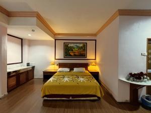 Letto o letti in una camera di Cool Point Hotel