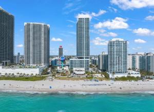 a view of a beach with tall buildings at Lyfe Oceanview Resort Luxury 2 Bedroom Unit in Hollywood