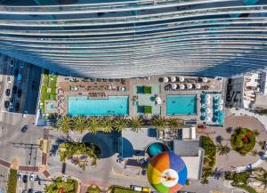 an overhead view of a large building with swimming pools at Lyfe Oceanview Resort Luxury 2 Bedroom Unit in Hollywood