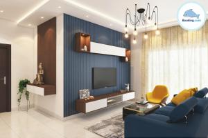 a living room with a couch and a tv at Delightful Apartment - Masteri Millennium - FREE Infinity Pool in Ho Chi Minh City